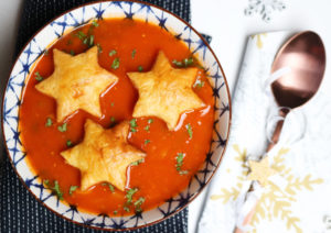 top view of christmas soup recipe with pastry stars