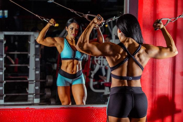Female bodybuilder training in the gym